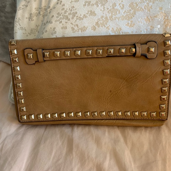 Handbags - Tan studded leather clutch.